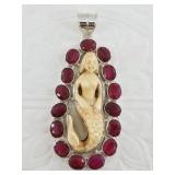 Sterling silver and ruby pendant with carved merma