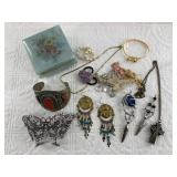 Box with fashion jewelry, very ornate butterfly or