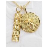 14kt Gold necklace with 2 charms, total weight of
