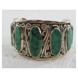 Detailed vintage cuff bracelet with what appears t