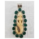Sterling silver and emerald pendant with carved me