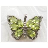 Intricate sterling silver butterfly pendant with c