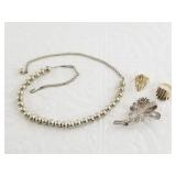 Antique silver jewelry including brooch, necklace