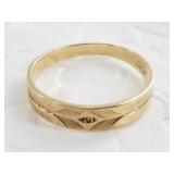 10kt Gold band with small diamond inset size 10 1/