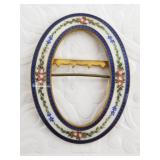 Enameled belt buckle