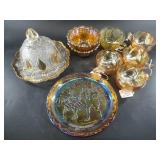 Several pieces of carnival glass and a gold plated