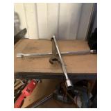 Tire iron and large Crescent wrench