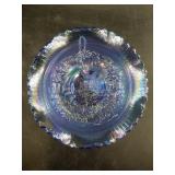 Blue carnival glass candy dish with windmill raise