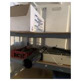 Lot with an old box fan, greasers, fish shipping b