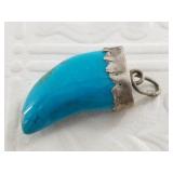 Silver and turquoise pendant, carved in shape of a