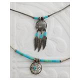 Pair of sterling silver pawn style necklaces