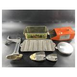 Vintage cast iron corn bread mold and a blueberry