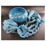 Artisan hanging pot with vibrant blue glaze and is