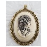 Vintage Sarah Coventry cameo pendant with gold ton