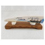 Richard Freeman colored scrimshaw of a canoe full