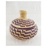 Kathryn Tangiegat lidded woven grass basket from C