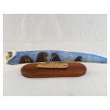 Michael Scott colored scrimshaw of a group of walr