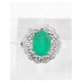 Natural Columbian and diamond ring set in platinum