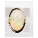 14kt Gold, opal and diamond ring size 8, white fir