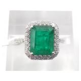 Gem quality emerald and diamond ring set in platin