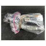 Four 100 count bags of small game pieces