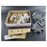 Mixed lot of brass snow cleats and a ball hitch