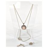 Sterling silver necklace with 3 charms and a short