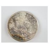 1 Troy oz. silver round resembles a Morgan silver