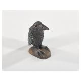 Raven carved from antler, with iridescent color ab