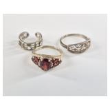 3 Sterling silver rings, 1 is a toe ring, garnet r