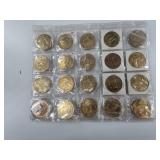 19 Fur Rondy coins and an Alaskan mint bronze seal