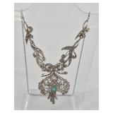 Vintage silver necklace with emerald center, and a