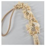 Carved bone necklace with bears, birds, and many o
