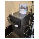 Two drawer metal filing cabinet with paper collect