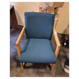 Upholstered chair with hardwood frame, small rip i