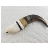 Large bear claw carving with a baleen and ivory en