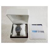 Cyna Navy star watch in original box, needs batter