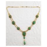 Fabulous green jade necklace on a gold tone chain