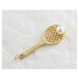 14kt Gold pendant in the shape of a tennis racket