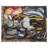 Collection of Fur Rondy buttons and bolo ties