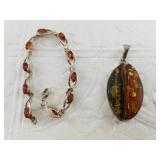 Two beautiful pieces of vintage amber and sterling