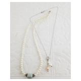 Sterling silver and pearl necklace with an additio