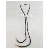 Nuguruk scrimshawed ivory bolo tie with fossil ivo