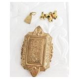 14kt Gold charm, total weight of .5 grams and a 10