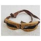 Pair of wood Native Alaskan snow goggles with leat