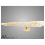 Large walrus tusk with an incredibly detailed, car