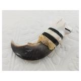 Massive seal claw carving with a walrus ivory bear