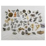 Box of very detailed charms and beads