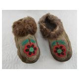 Lovely pair of old Athabaskan slippers featuring t