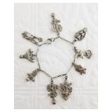 Silver charm bracelet, acid tested at a high purit